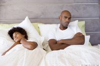 Sad couple in bed(Classic 105)