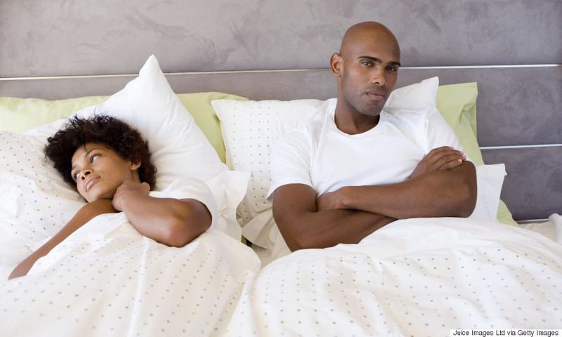 Sad couple in bed(Classic 105)