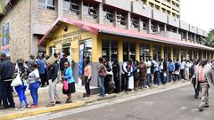Kenyans at an immigration office. Kenyans without e-passport will not be granted the Schengen visa from June 1