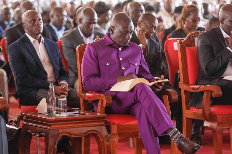 File image of President William Ruto in church