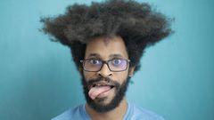 A young man with shaggy hair