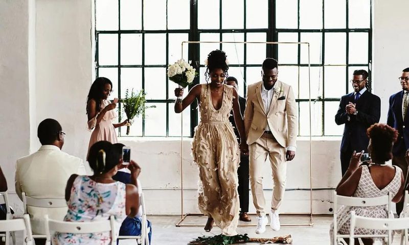 Jumping the broom is a positive omen and tradition [Robynashleyweddings]