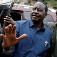 File image of former Prime Minister Raila Odinga and his bodyguard, Maurice Ogeta