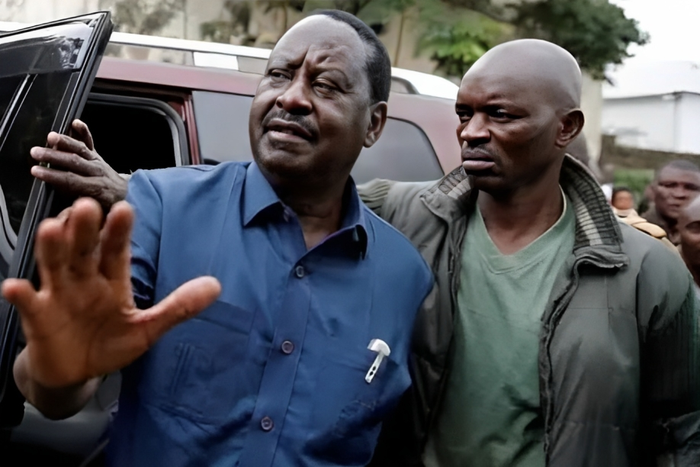 File image of former Prime Minister Raila Odinga and his bodyguard, Maurice Ogeta