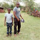 Phil Director and his adopted son Leon Karanja