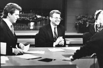 Jerry Springer chatting with co-anchor Jim Watkins and a technician before a news broadcast at WLWT-TV.Steve Kagan/Getty Images