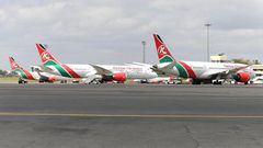 A picture taken on August 1, 2020 shows Kenya Airways planes parked at the parking bay at the Jomo Kenyatta international airport in Nairobi as Kenya Airways airline resumed flights to Britain after flights had been canceled during the COVID-19 (novel ...