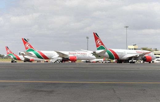 A picture taken on August 1, 2020 shows Kenya Airways planes parked at the parking bay at the Jomo Kenyatta international airport in Nairobi as Kenya Airways airline resumed flights to Britain after flights had been canceled during the COVID-19 (novel ...