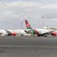 A picture taken on August 1, 2020 shows Kenya Airways planes parked at the parking bay at the Jomo Kenyatta international airport in Nairobi as Kenya Airways airline resumed flights to Britain after flights had been canceled during the COVID-19 (novel ...