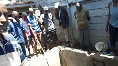 Rescuers operations at the well that caved in, killing six people who were heading to a wedding in Ruiru