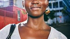 A woman with a nose piercing