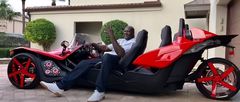 Shaq O'Neal in one of his cars