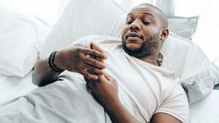 A man looking at his phone