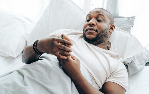 A man looking at his phone