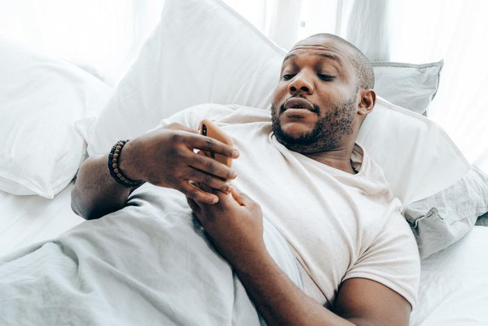 A man looking at his phone