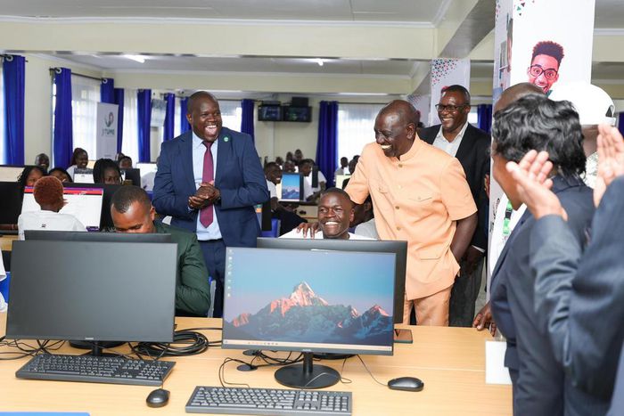 President William Ruto with a Remotasks user Brian Kipchumba at Kaiboi National Polytechnic
