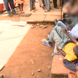 A crowd at the scene where several people died and others went blind after consuming illicit brew in Kirinyaga
