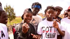 Kenyan rapper Stoopid Boy and his crew
