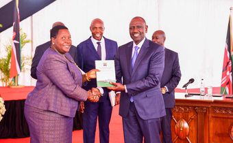 President William Ruto receiving a report from the Presidential Working Party on Education Reforms at State House on August 1, 2023