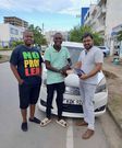 Vincent Mboya with his first car