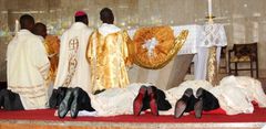 Catholic priest during consecration
