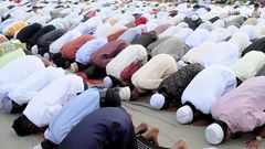 Muslims praying