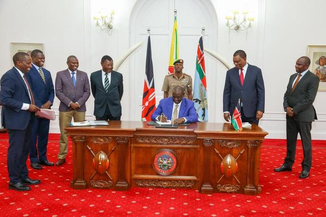 President William Ruto assents to a bill at State House, Nairobi