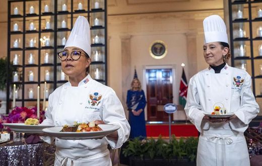 White House Executive Chef Cris Comerford holding meals to be served at President Ruto's state dinner at the White House. Photo Credit: Jacquelyn Martin/AP