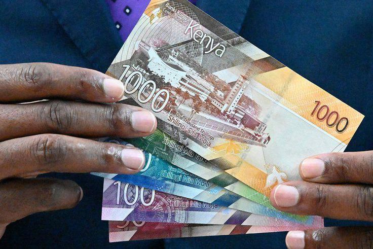 [FILE] Central Bank of Kenya (CBK) governor Patrick Njoroge displays some of the new designs for the Kenyan currency notes in 2019.