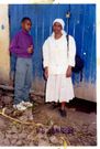 A young Boniface Mwangi and his mother