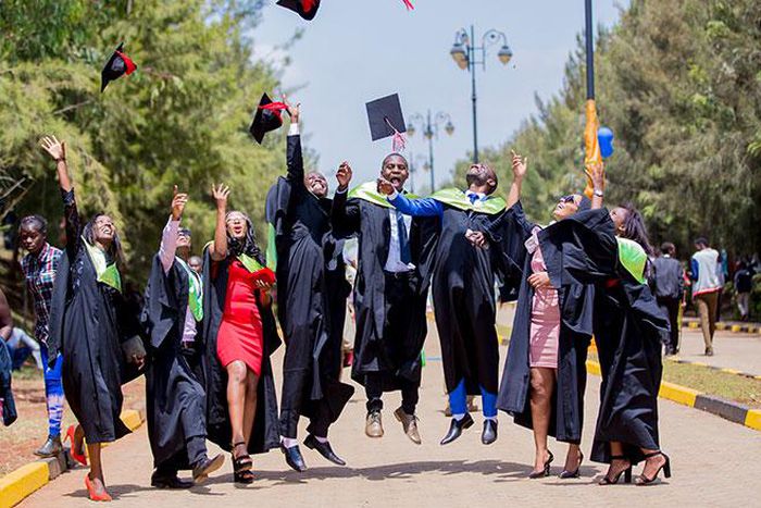 Graduates celebrating after competing their studies