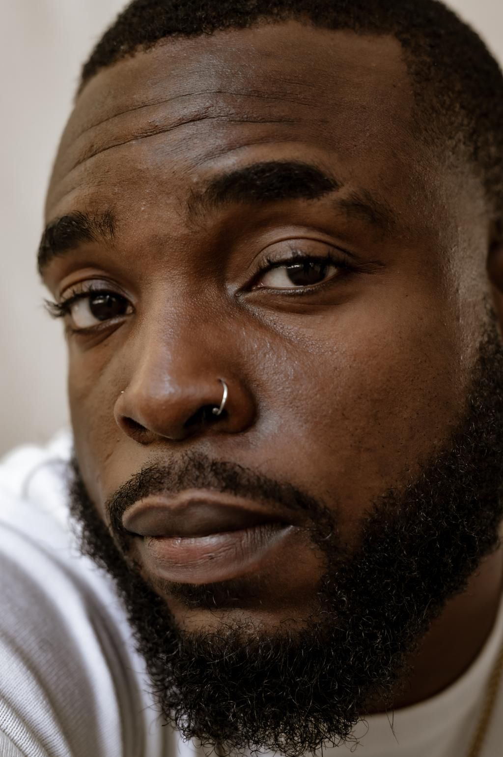 A man with a nose ring