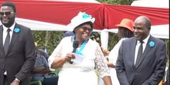 Former IEBC Chair Wafula Chebukati (right), his wife Mary and son Emmanuel