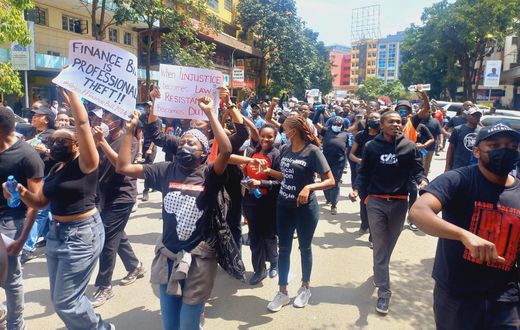 Kenyans protesting tax propasals in the Finance Bill 2024
