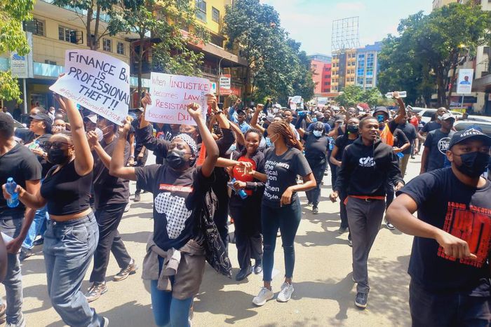 Kenyans protesting tax propasals in the Finance Bill 2024