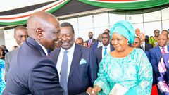 File image of President William Ruto greeting Musalia Mudavadi 's wife Tessie during the Mashujaa Day celebrations at Uhuru Gardens