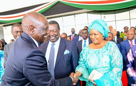 File image of President William Ruto greeting Musalia Mudavadi 's wife Tessie during the Mashujaa Day celebrations at Uhuru Gardens