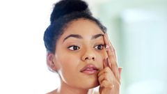 Lady fixing contact lens