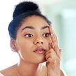 Lady fixing contact lens