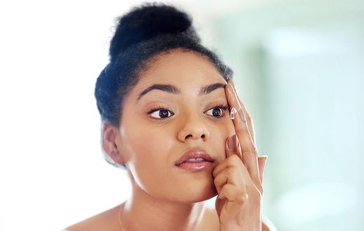 Lady fixing contact lens