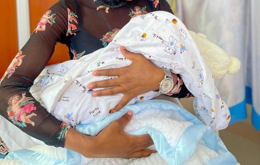 Carey Priscilla and her baby