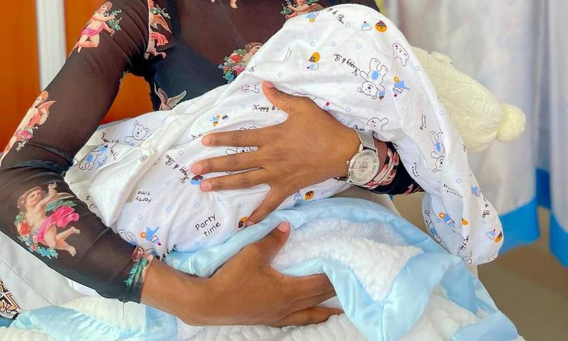 Carey Priscilla and her baby