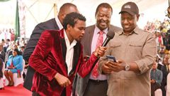 President William Ruto, Prime Cabinet Secretary Musalia Mudavadi and comedian Chipukeezy during the launch of Hustler Fund in Nairobi on November 30, 2022