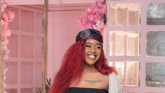 Azziad Nasenya poses for a photo