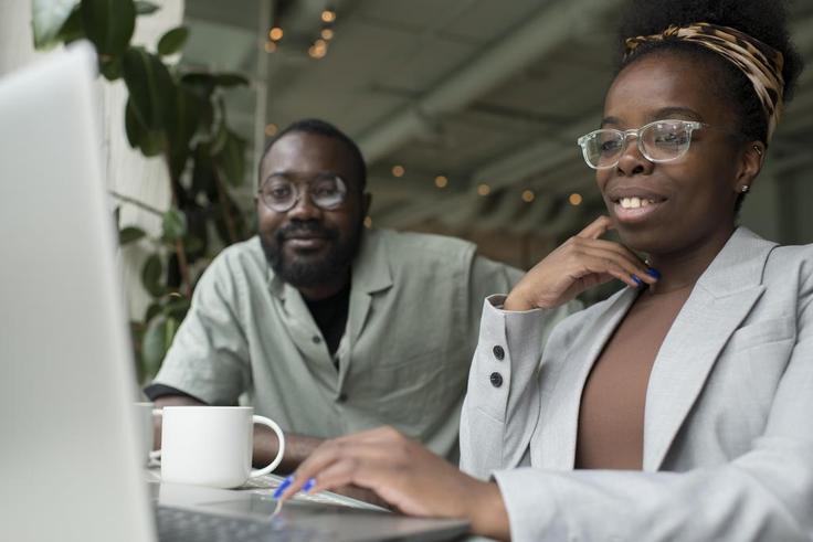 A photo of millennials working in an office