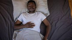 Man sleeping on a pillow