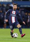 Lionel Messi dribbles during the French League 1 football match between Paris Saint-Germain FC and Angers at the Parc des Princes stadium in Paris on January 11, 2023.