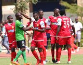 Oliver Mangeni celebrates the equalizing goal with his team mates