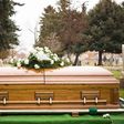 A casket during a burial