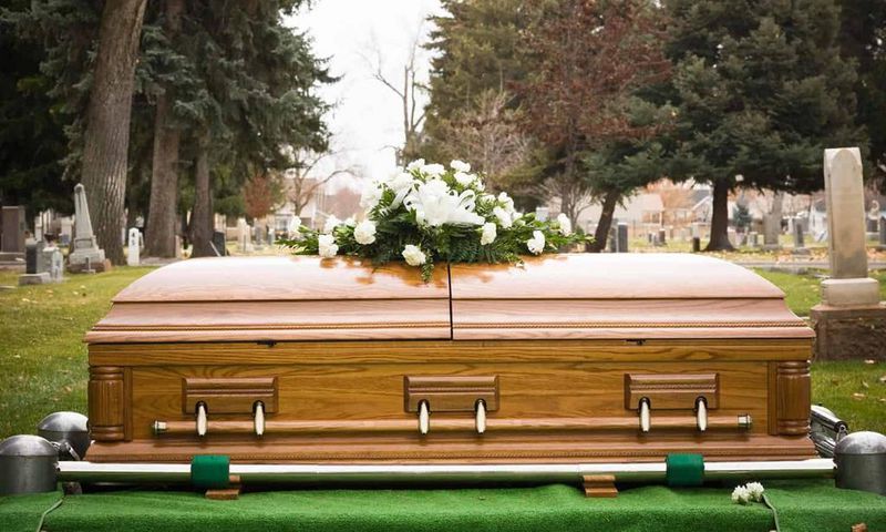A casket during a burial